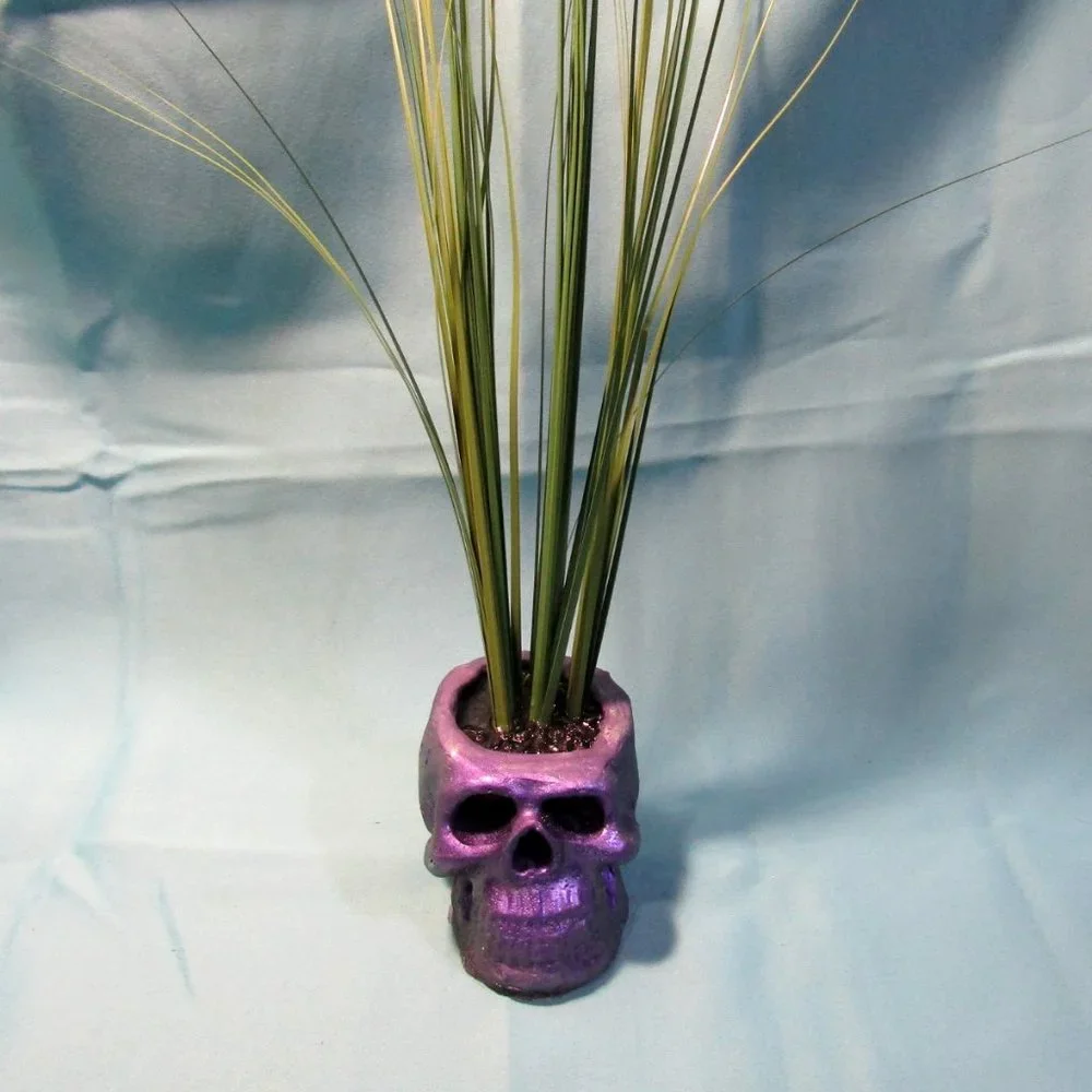 Aquarium Decoration - Purple Zombie Skull with Tall Green Plant.